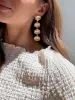 Calypso Seashell Earrings - Gold/Pearl sold by BaubleBar