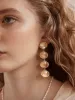 Calypso Seashell Earrings - Gold/Pearl sold by BaubleBar