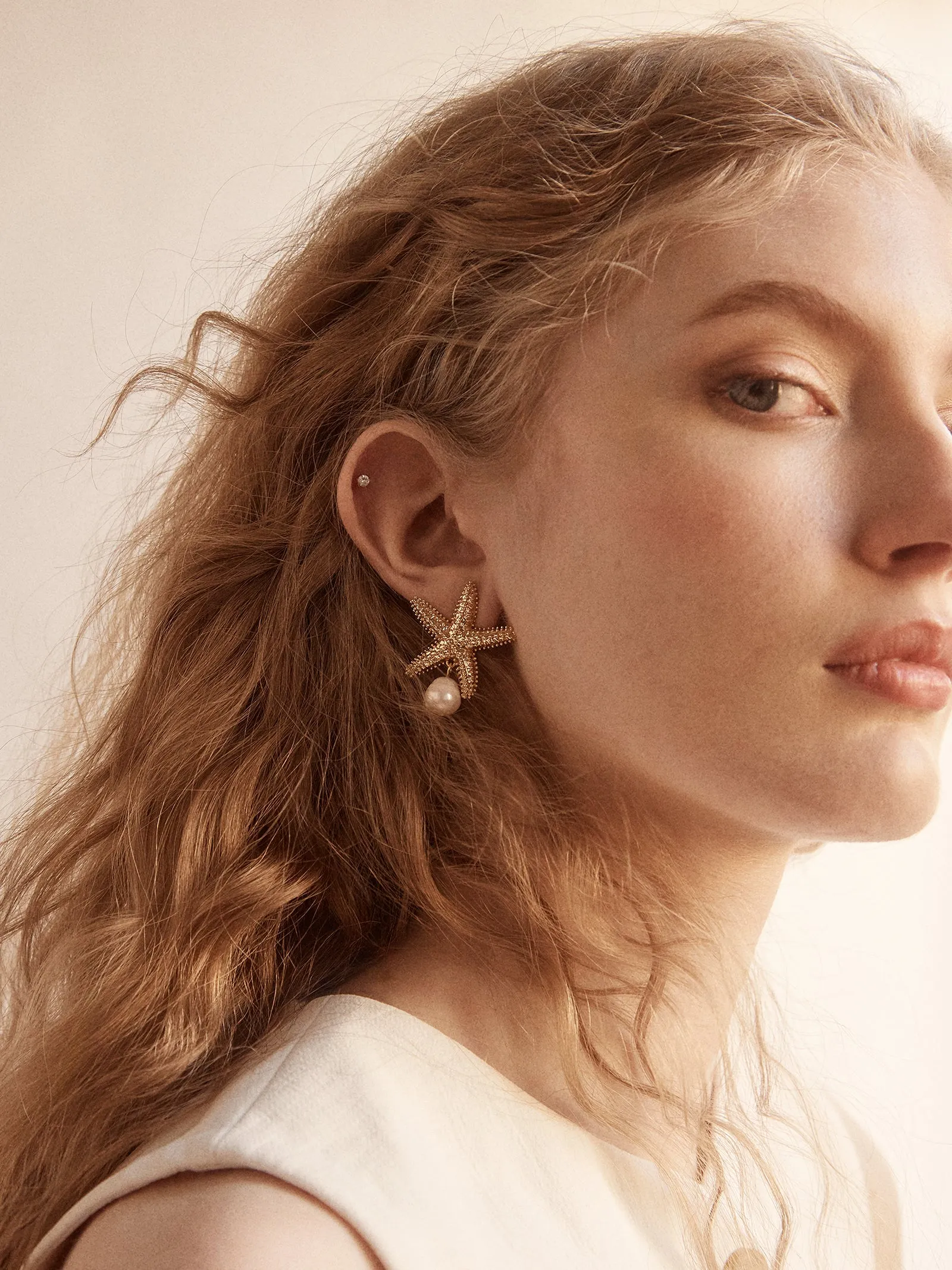 Alana Starfish Earrings - Gold/Pearl sold by BaubleBar product image thumbnail 2