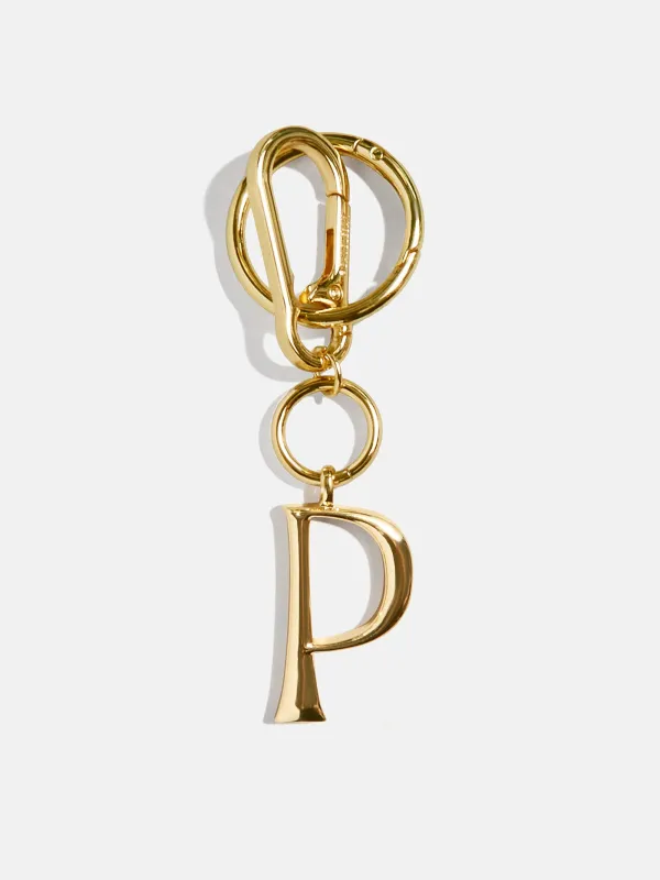 Gold Initial Enamel Bag Charm - P sold by BaubleBar