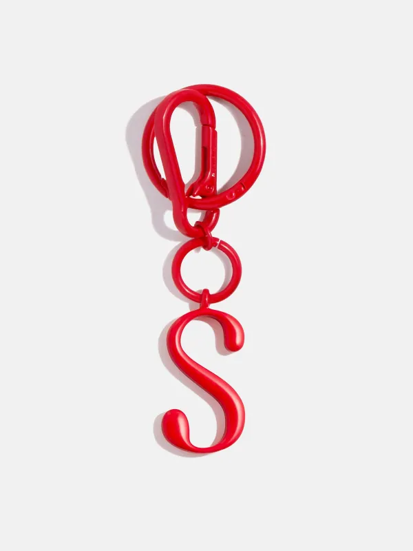 Red Initial Enamel Bag Charm - S sold by BaubleBar