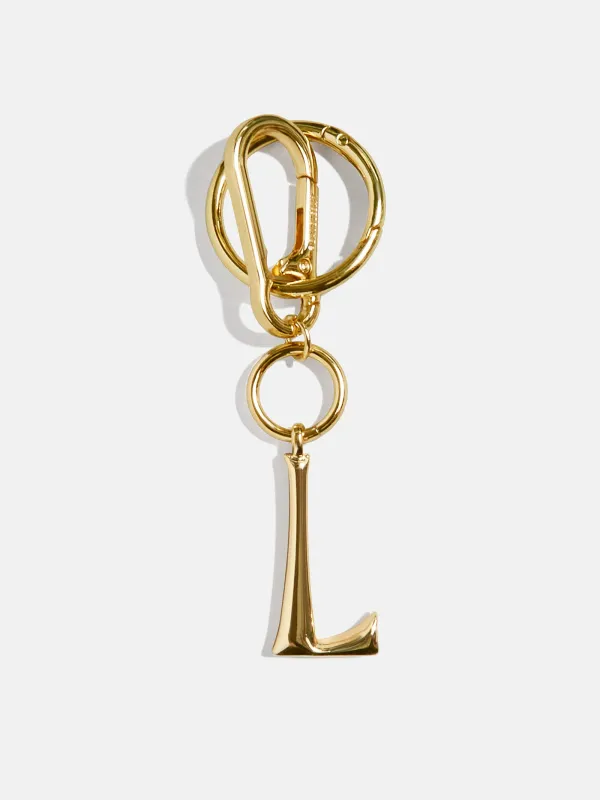 Gold Initial Enamel Bag Charm - L sold by BaubleBar