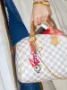Red Initial Enamel Bag Charm - P sold by BaubleBar