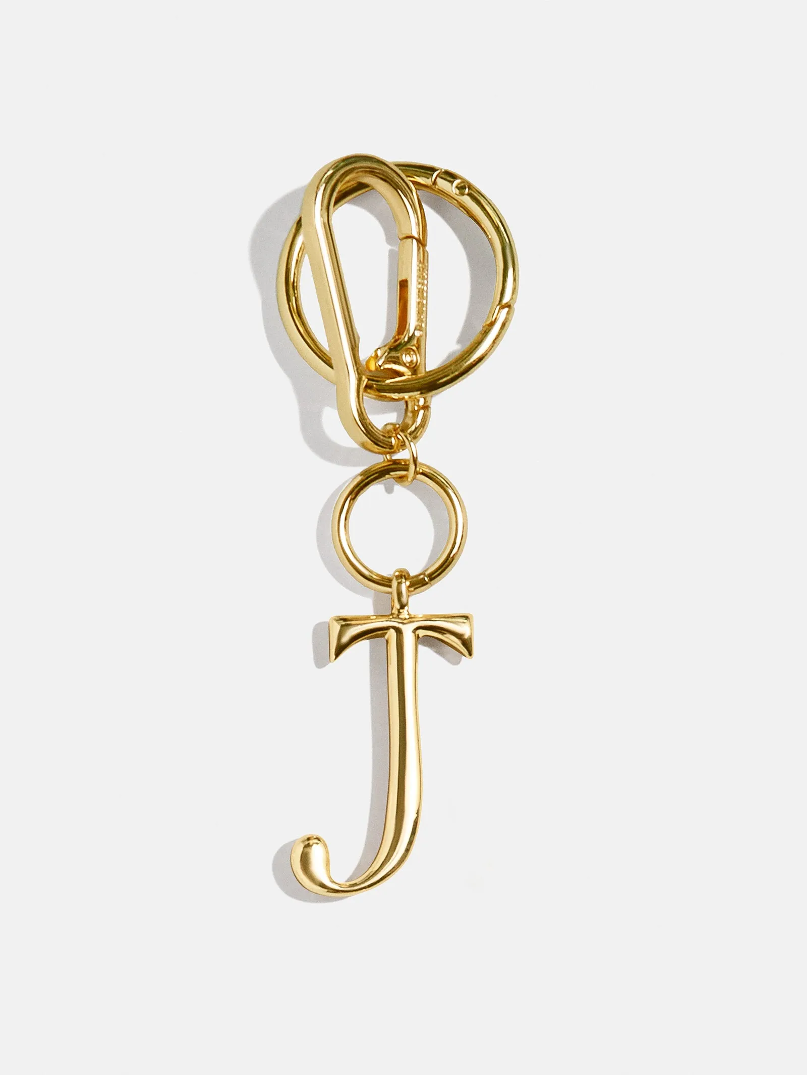 Gold Initial Enamel Bag Charm - J sold by BaubleBar
