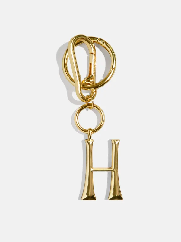 Gold Initial Enamel Bag Charm - H sold by BaubleBar
