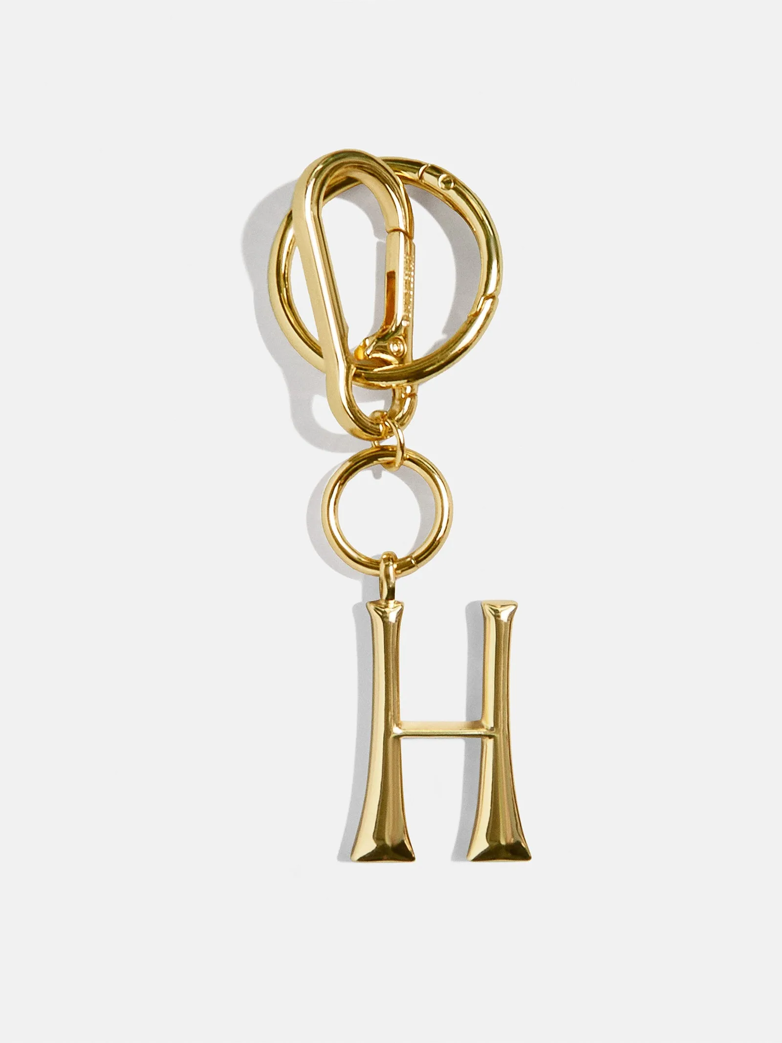 Gold Initial Enamel Bag Charm - H sold by BaubleBar