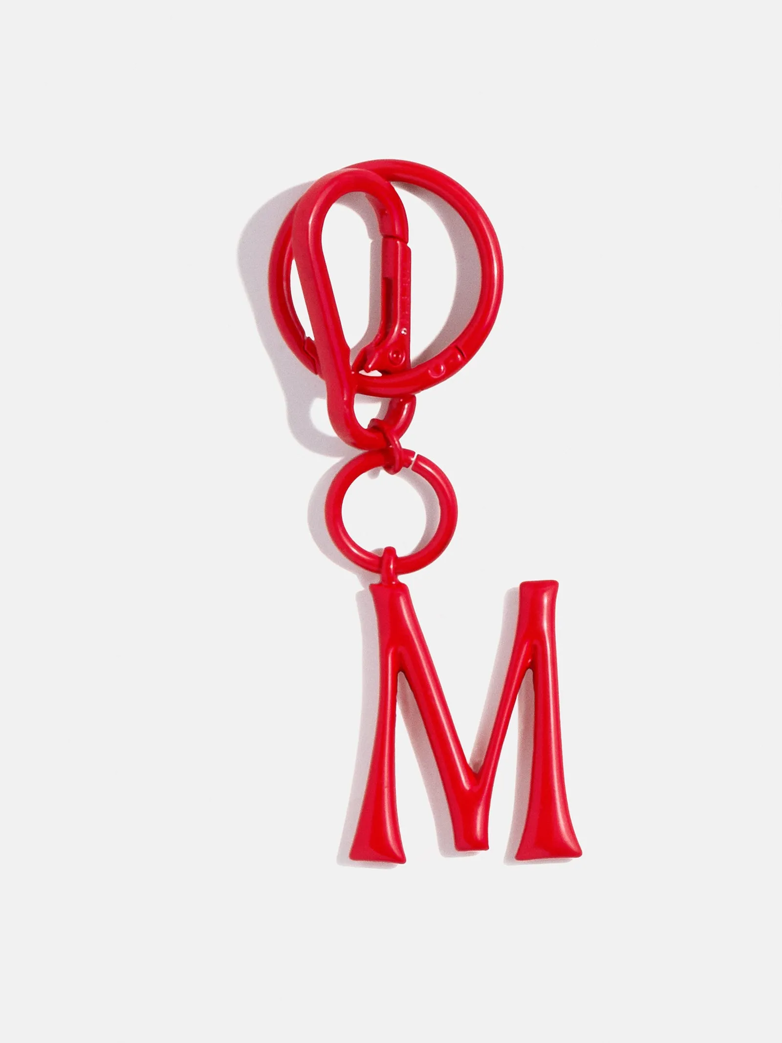 Red Initial Enamel Bag Charm - M sold by BaubleBar