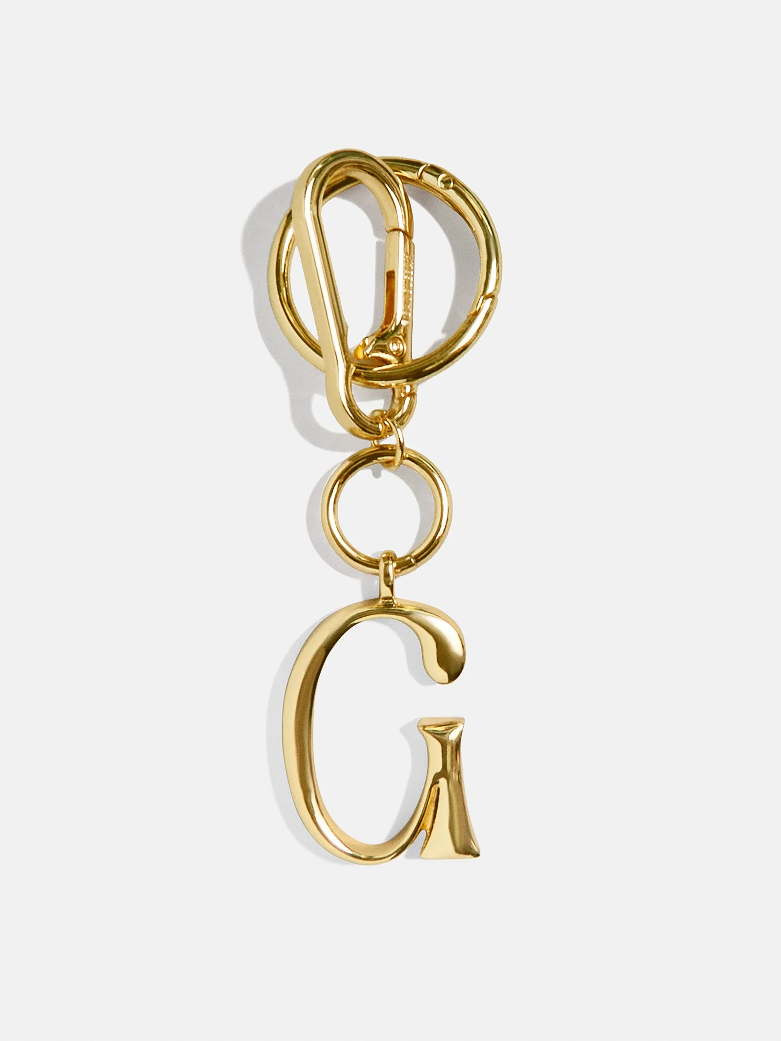 Gold Initial Enamel Bag Charm - G sold by BaubleBar