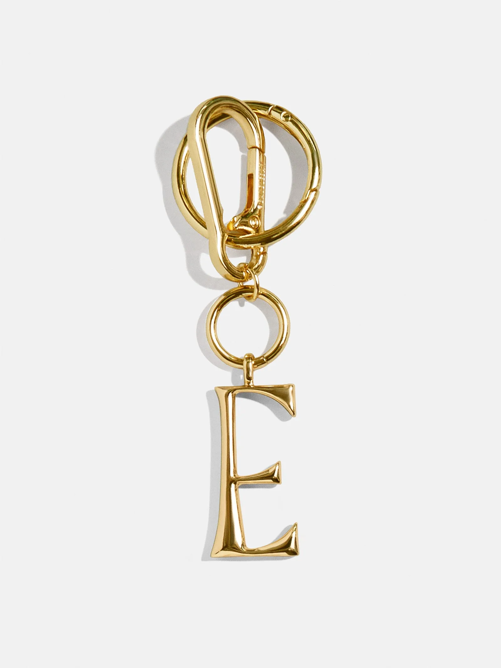 Gold Initial Enamel Bag Charm - E sold by BaubleBar