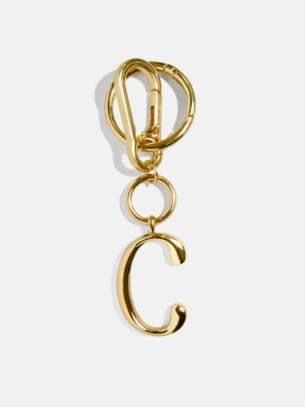 Gold Initial Enamel Bag Charm - C sold by BaubleBar