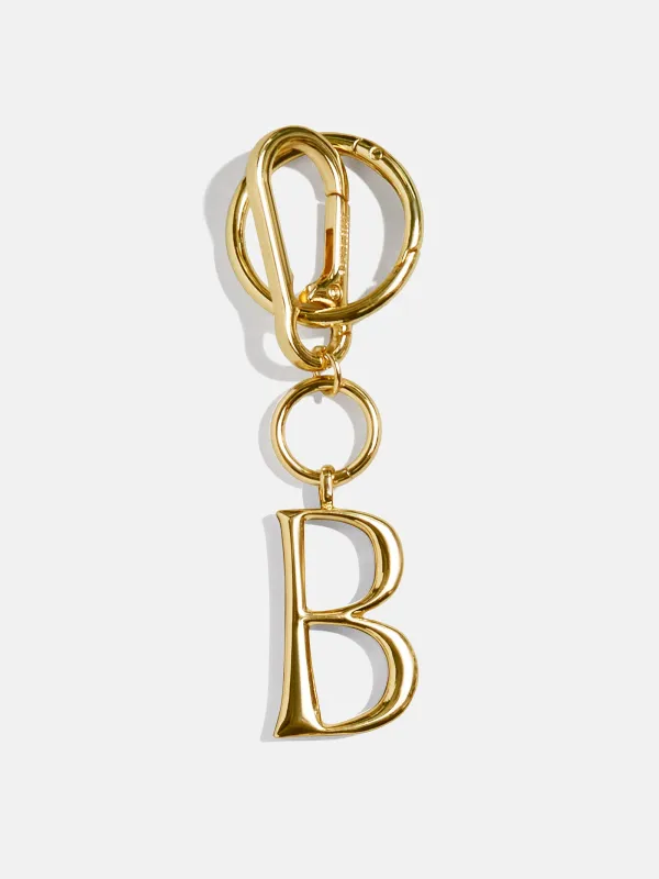 Gold Initial Enamel Bag Charm - B sold by BaubleBar