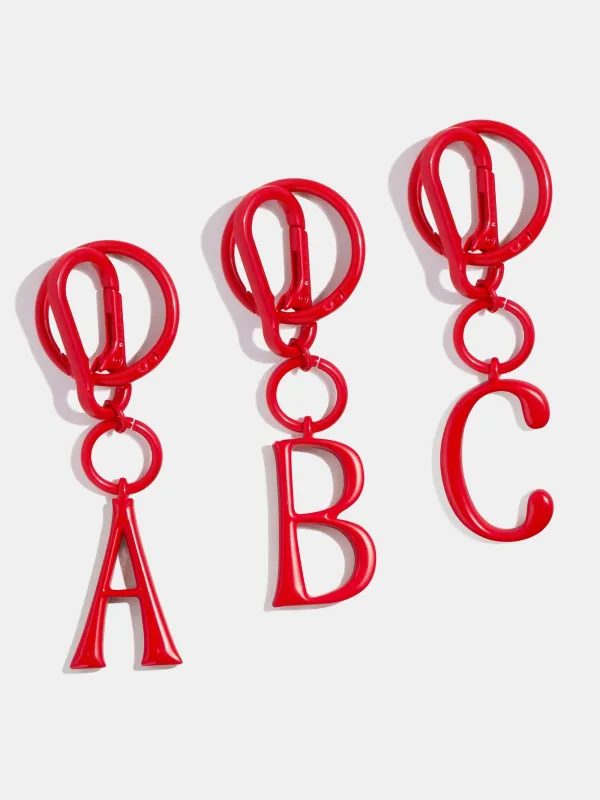 Red Initial Enamel Bag Charm - A sold by BaubleBar