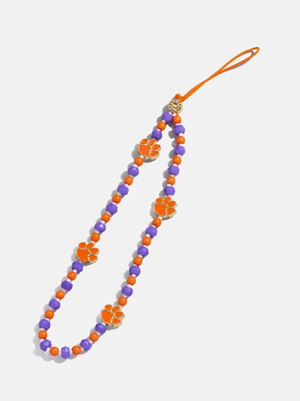 Clemson University Beaded Phone Charm - Clemson University sold by BaubleBar