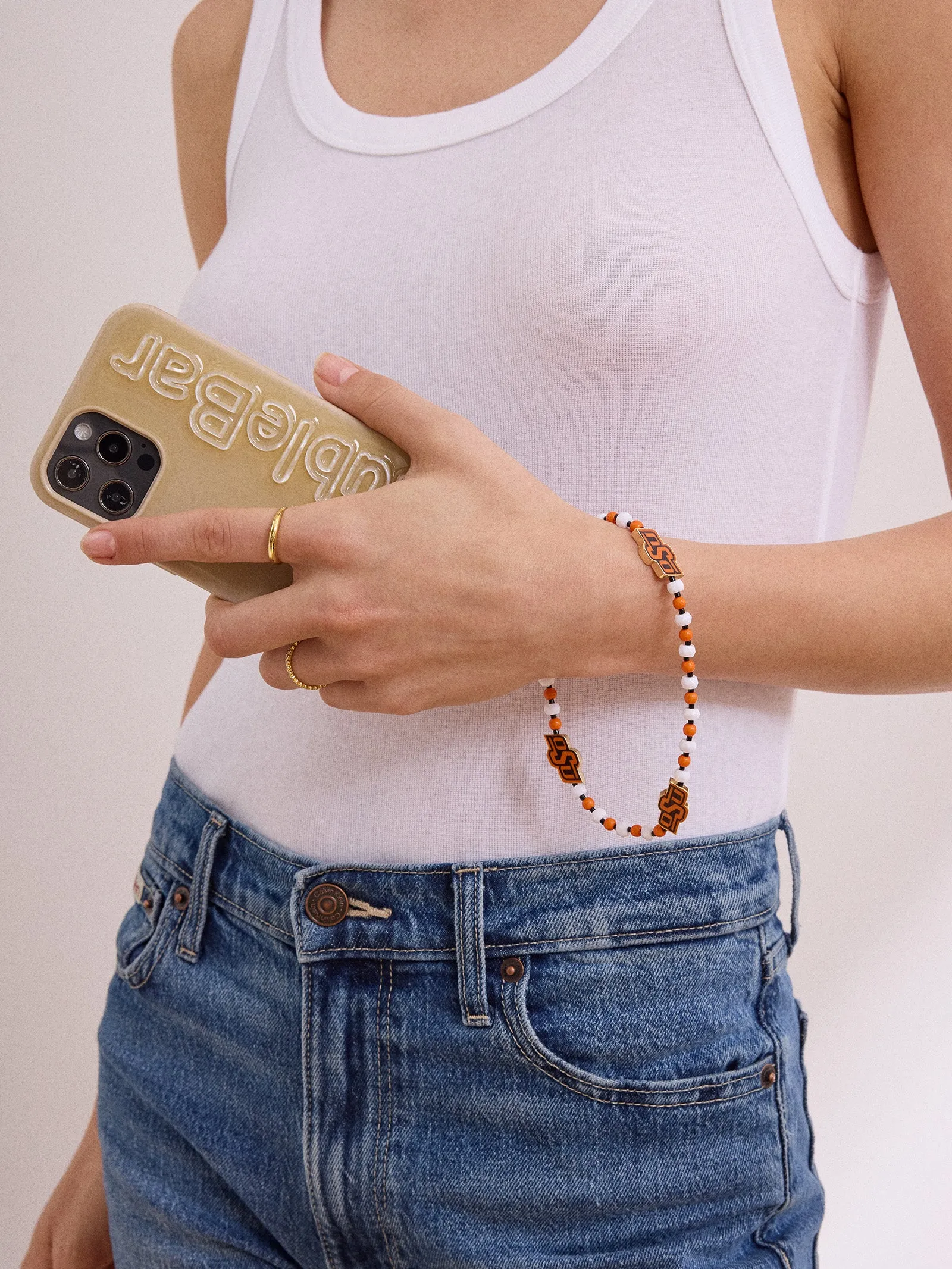 Oklahoma State University Beaded Phone Charm - Oklahoma State University sold by BaubleBar product image thumbnail 2