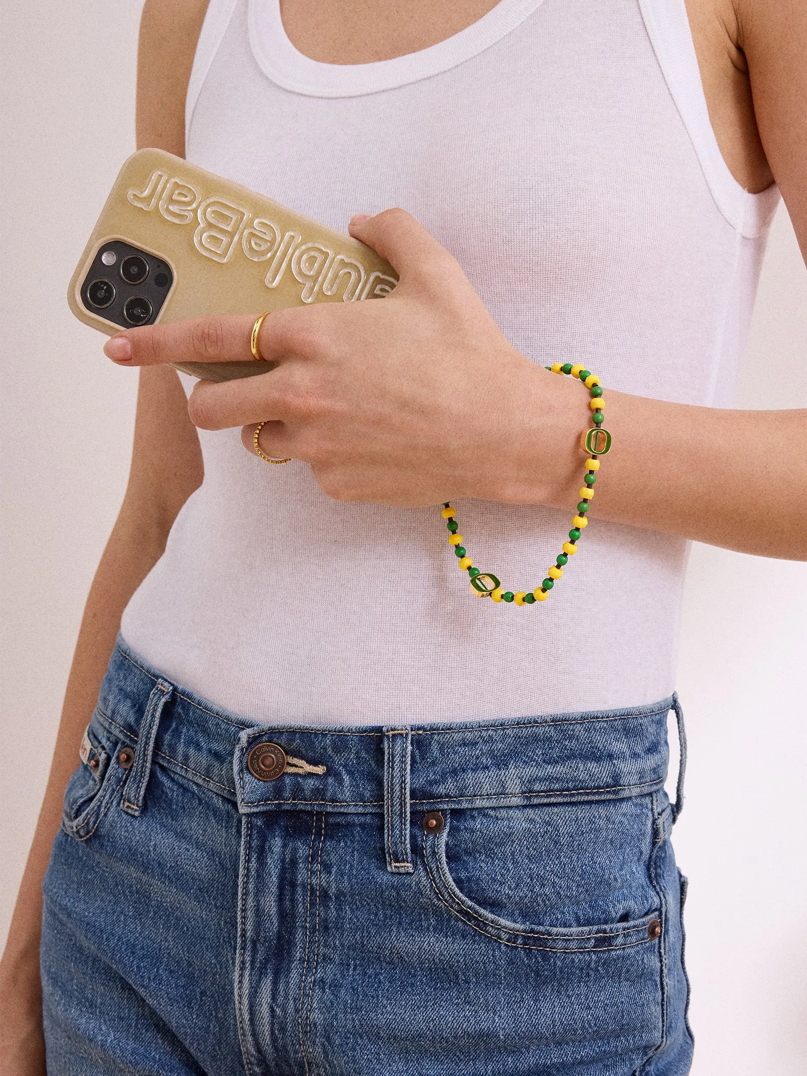 University of Oregon Beaded Phone Charm - University of Oregon sold by BaubleBar product image thumbnail 2