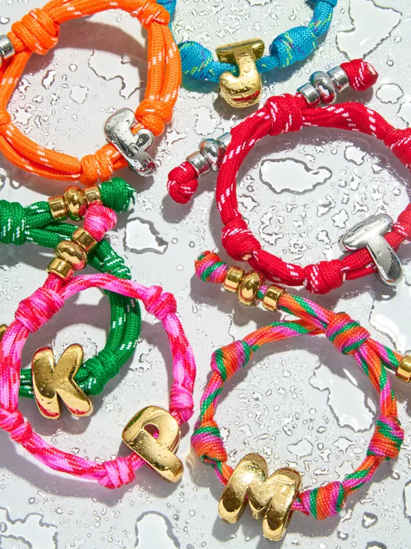 Knotty Initial Custom Bracelet - Fuchsia sold by BaubleBar