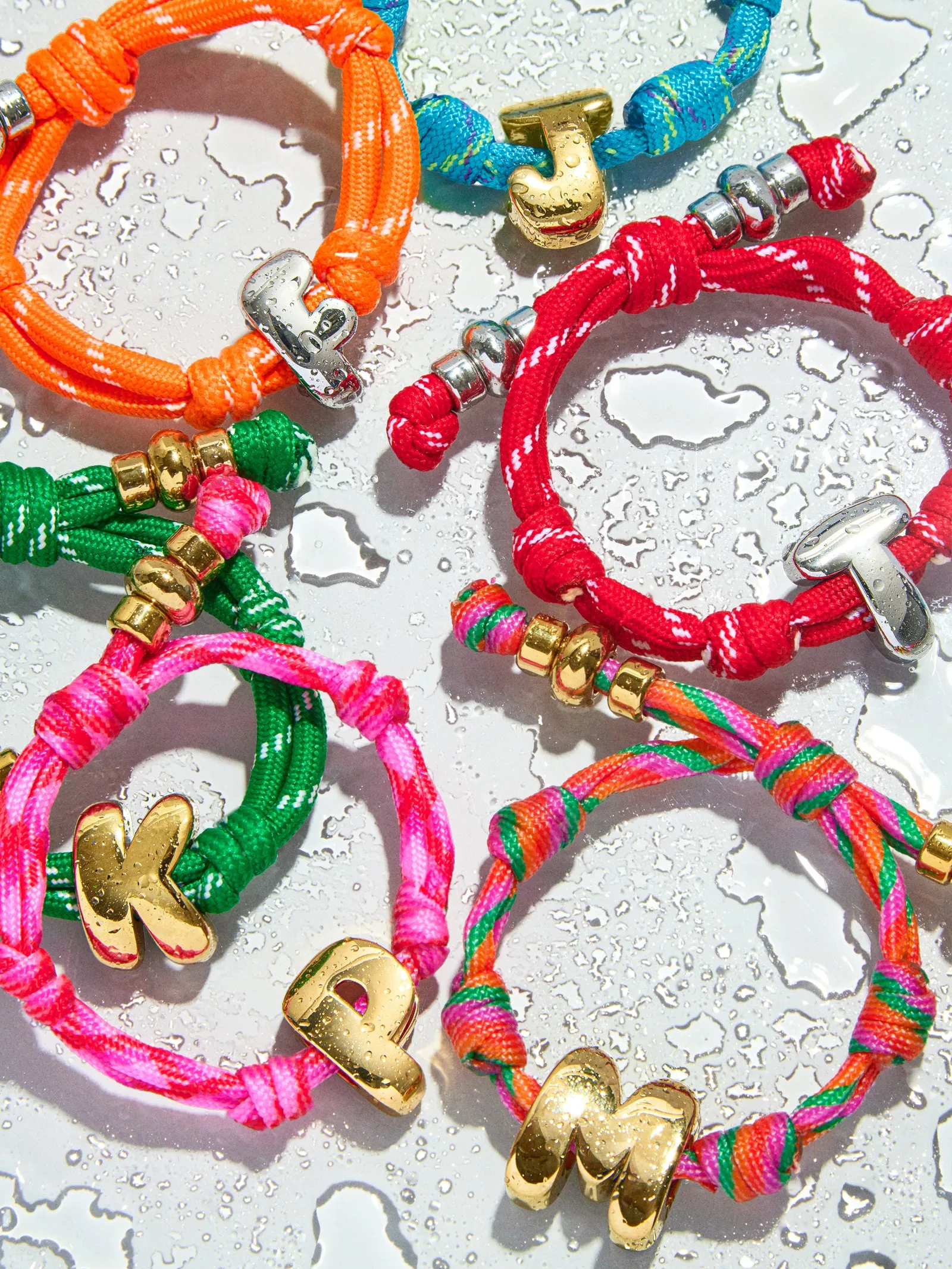 Knotty Initial Custom Bracelet - Fuchsia sold by BaubleBar