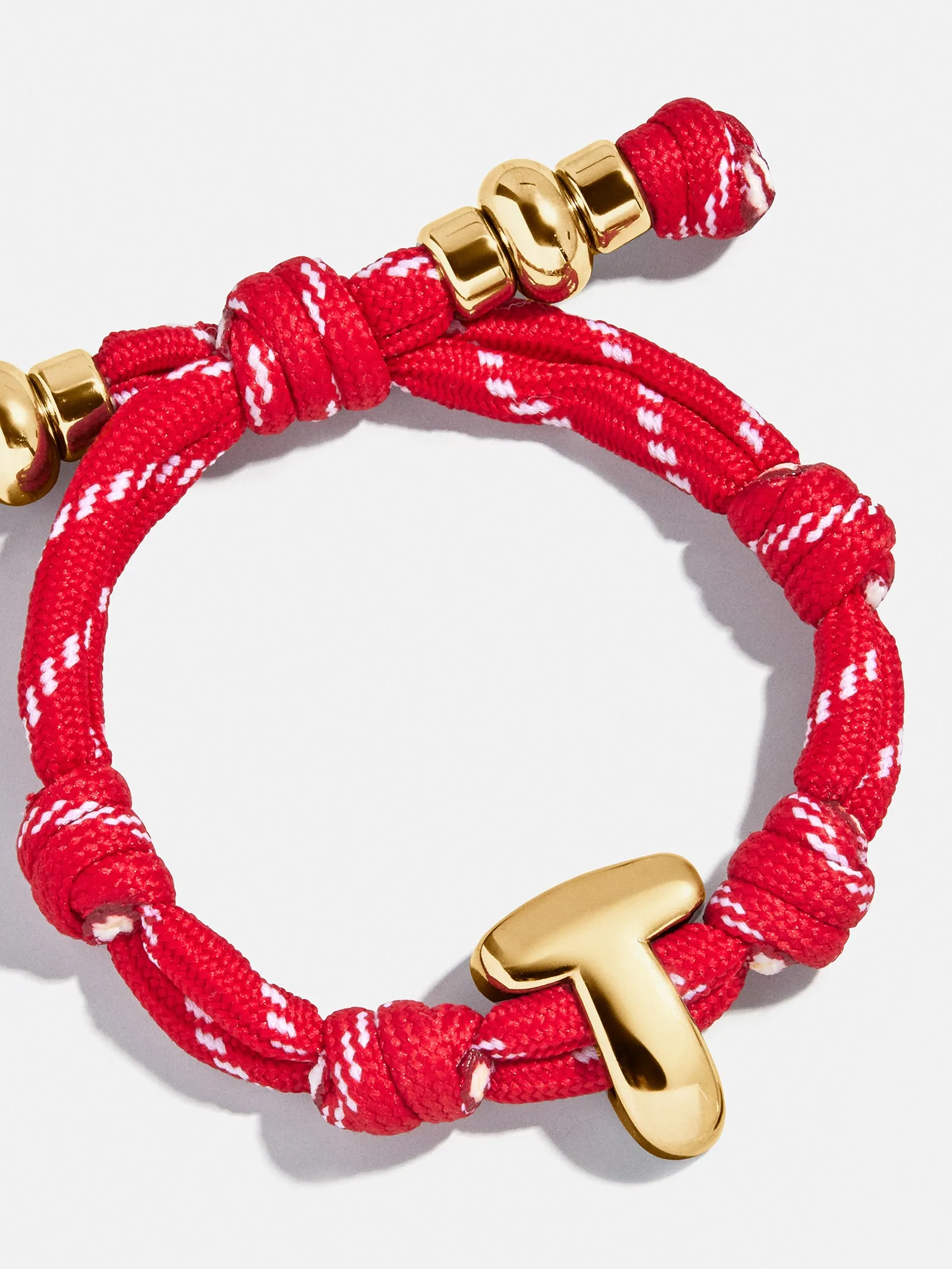 Knotty Initial Custom Bracelet - Cherry Red sold by BaubleBar