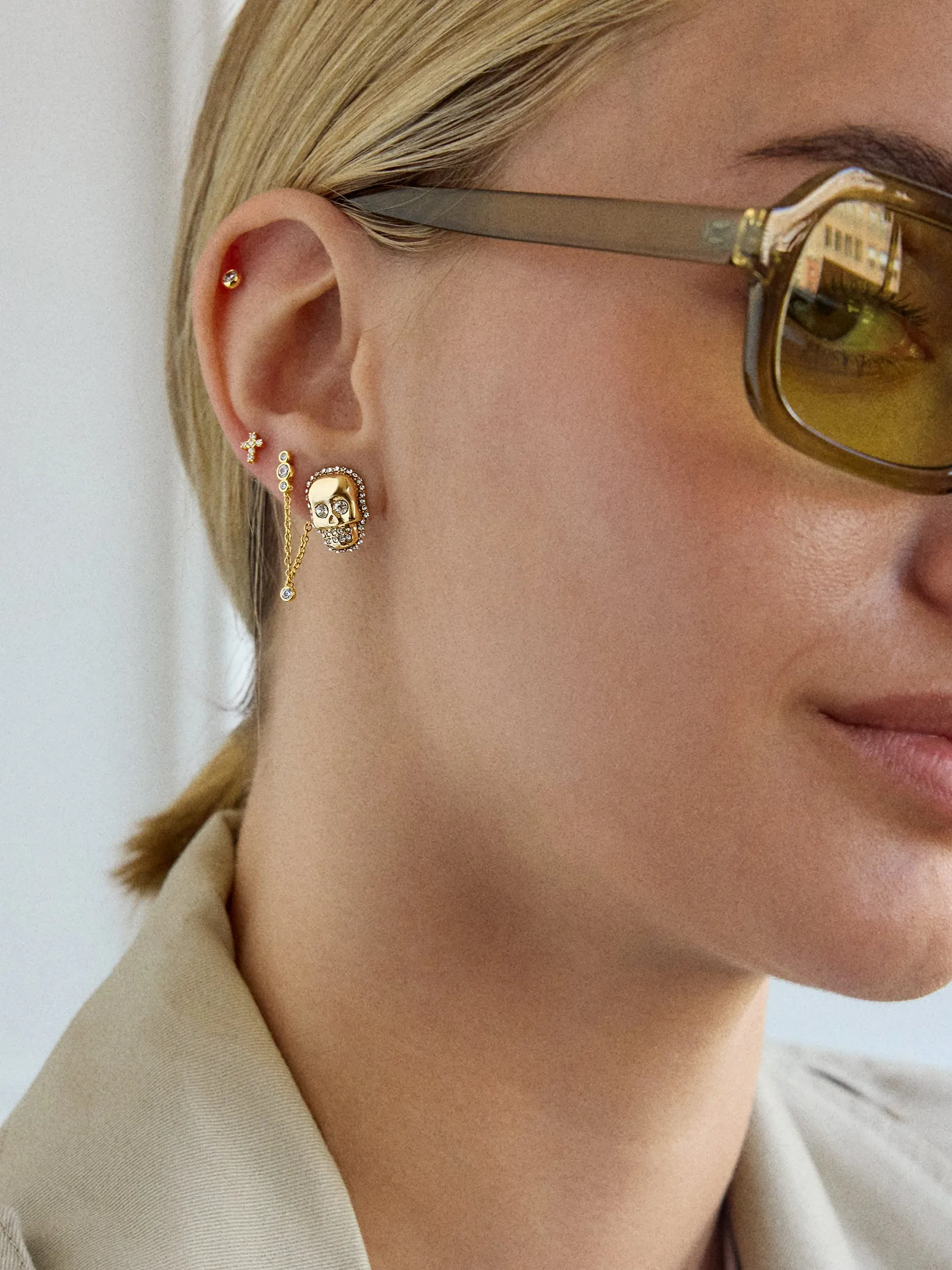 Gold and Pavé Skull Stud Earrings - Skull sold by BaubleBar product image thumbnail 2