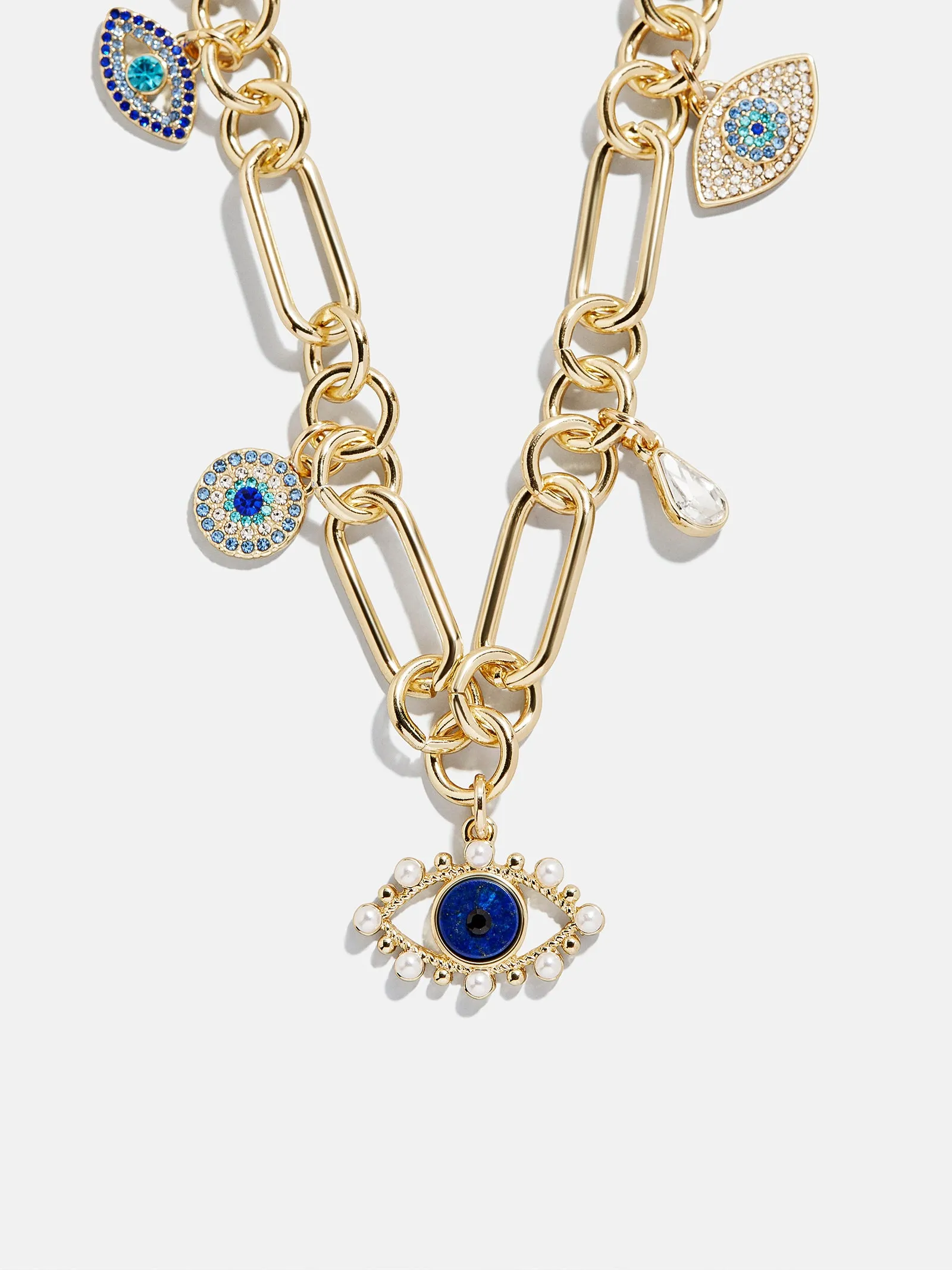 Ojo Evil Eye Charm Necklace - Gold/Blue sold by BaubleBar