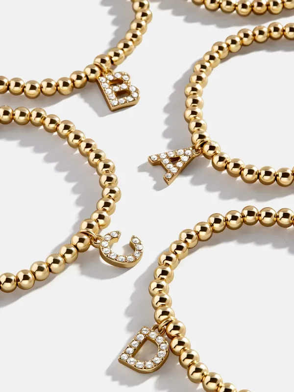 Dangle Charm Initial Pisa Bracelet - Gold/Pavé sold by BaubleBar