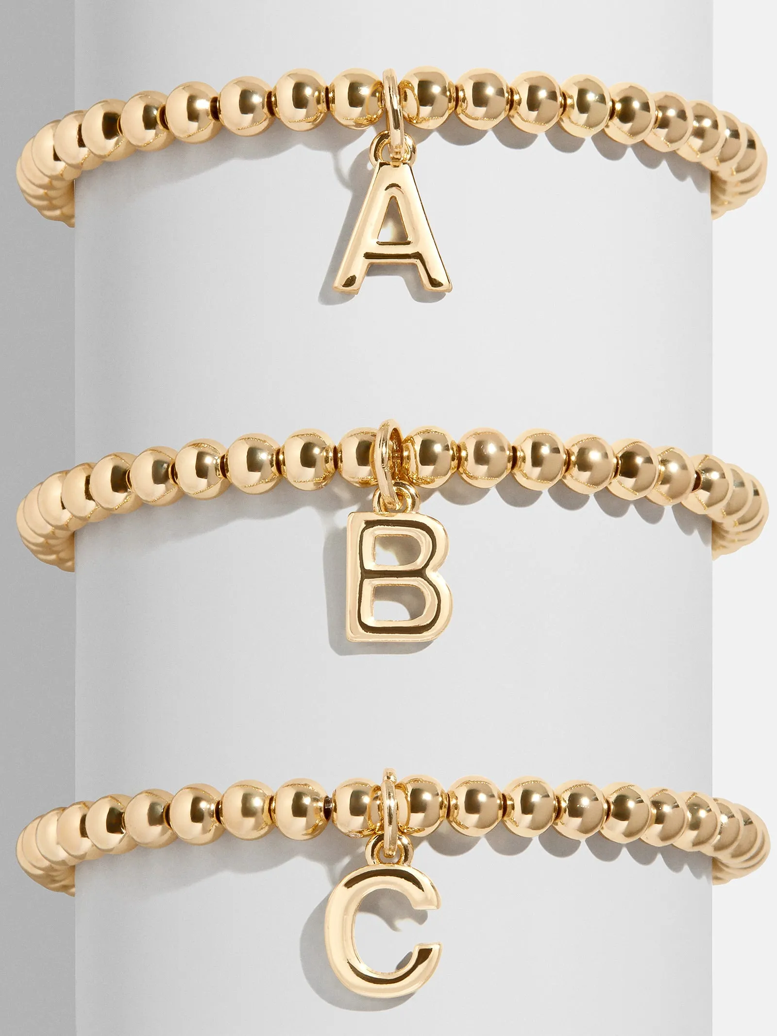 Dangle Charm Initial Pisa Bracelet - Gold sold by BaubleBar