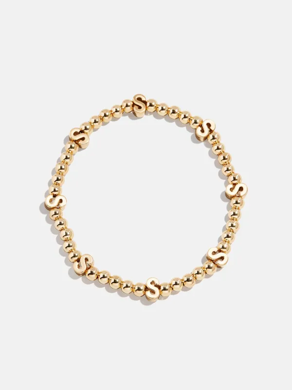 Gold Repeating Initial Pisa Bracelet - S sold by BaubleBar