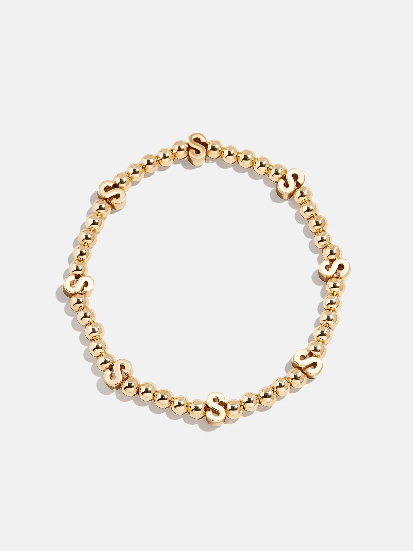 Gold Repeating Initial Pisa Bracelet - S sold by BaubleBar