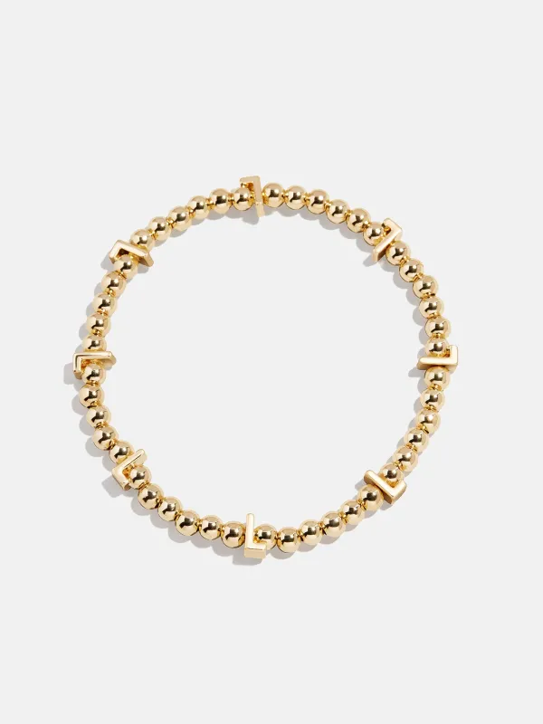 Gold Repeating Initial Pisa Bracelet - L sold by BaubleBar