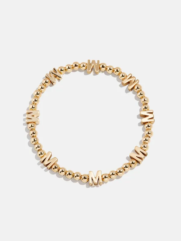Gold Repeating Initial Pisa Bracelet - M sold by BaubleBar