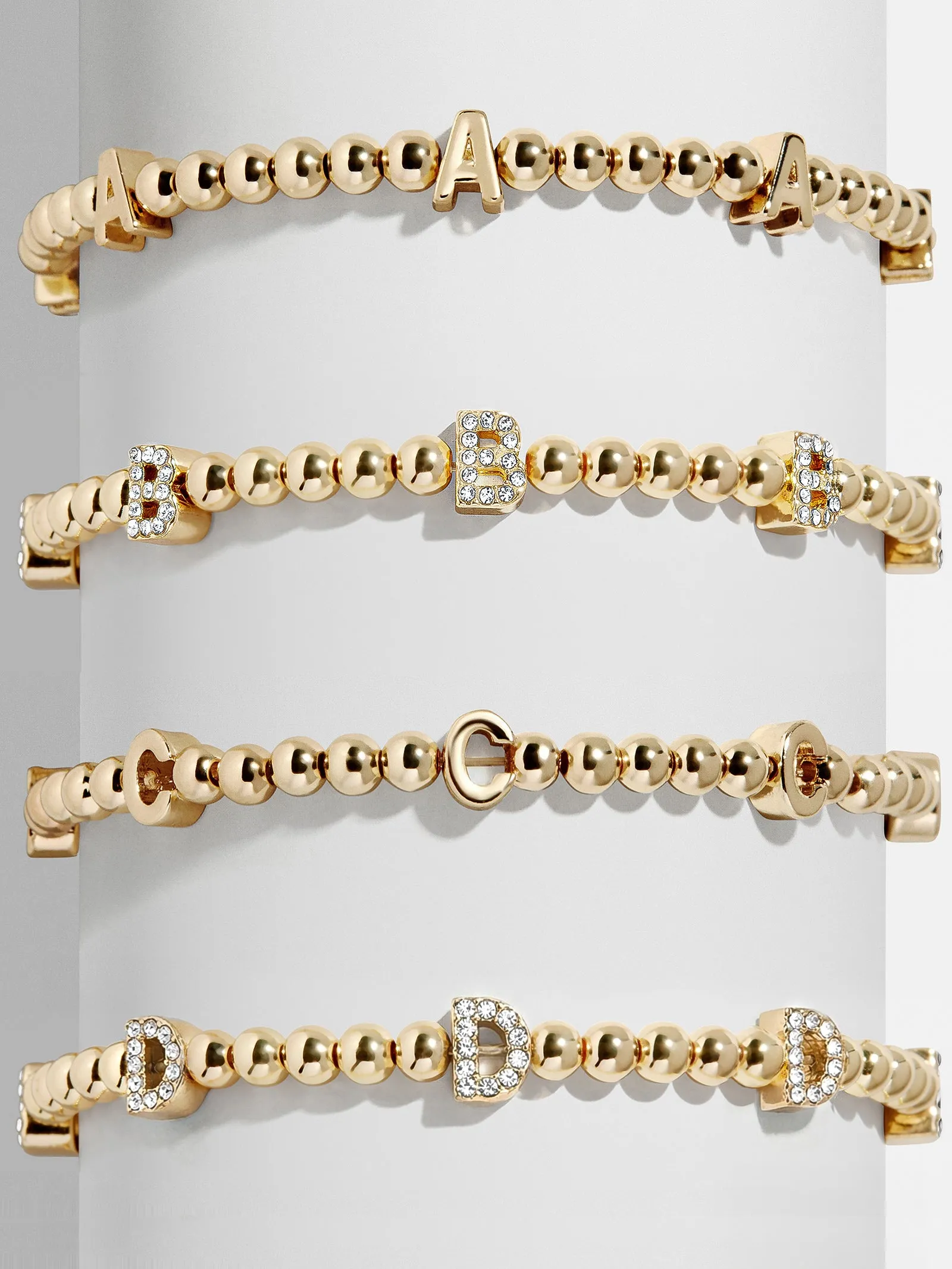 Gold Repeating Initial Pisa Bracelet - A sold by BaubleBar