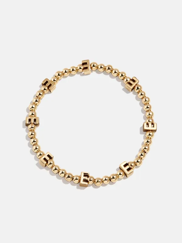 Gold Repeating Initial Pisa Bracelet - E sold by BaubleBar