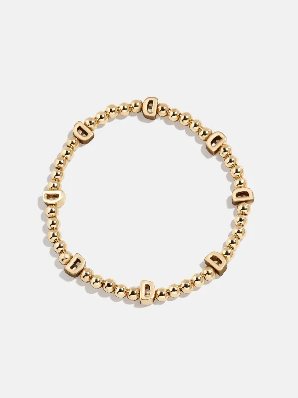 Gold Repeating Initial Pisa Bracelet - D sold by BaubleBar