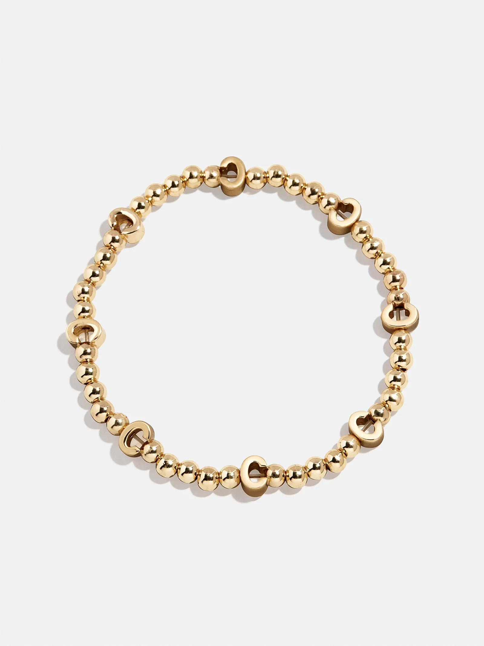 Gold Repeating Initial Pisa Bracelet - C sold by BaubleBar