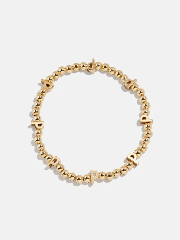 Gold Repeating Initial Pisa Bracelet - P sold by BaubleBar