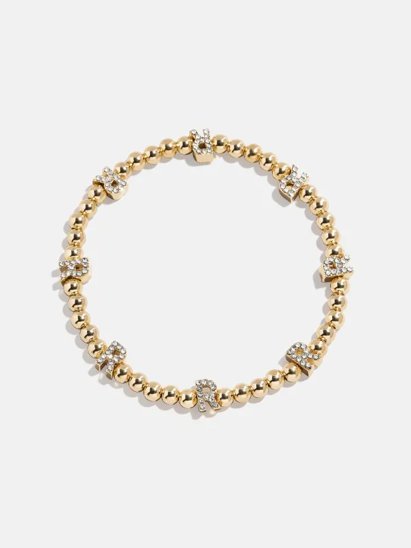 Gold/Pavé Repeating Initial Pisa Bracelet - R sold by BaubleBar
