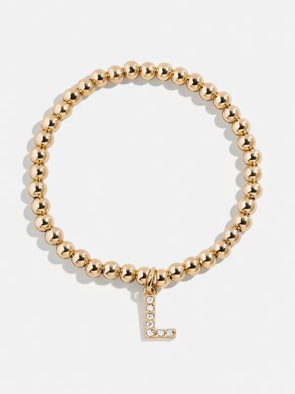 Gold/Pavé Dangle Charm Initial Pisa Bracelet - L sold by BaubleBar