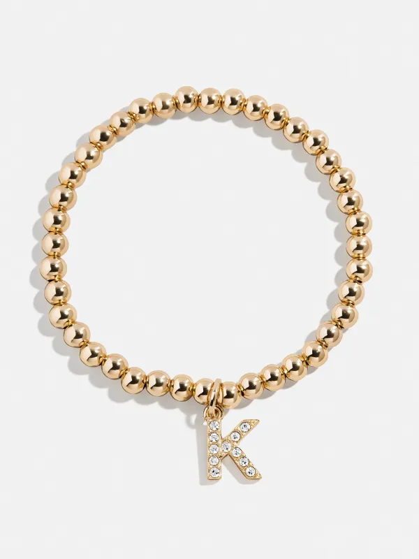Gold/Pavé Dangle Charm Initial Pisa Bracelet - K sold by BaubleBar