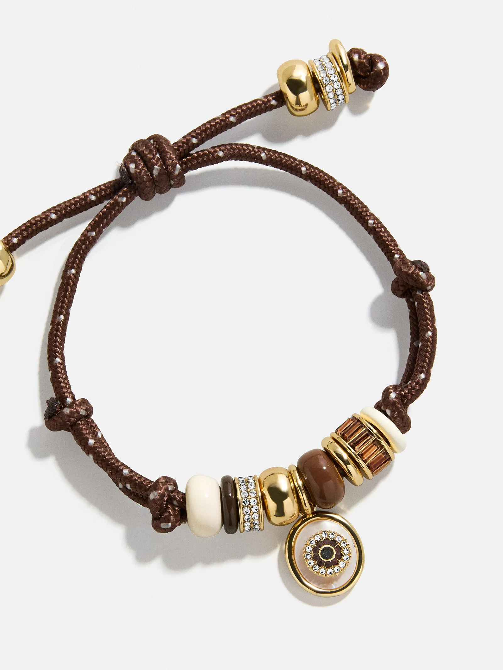 Eye Candy Evil Eye Paracord Bracelet - Brown sold by BaubleBar