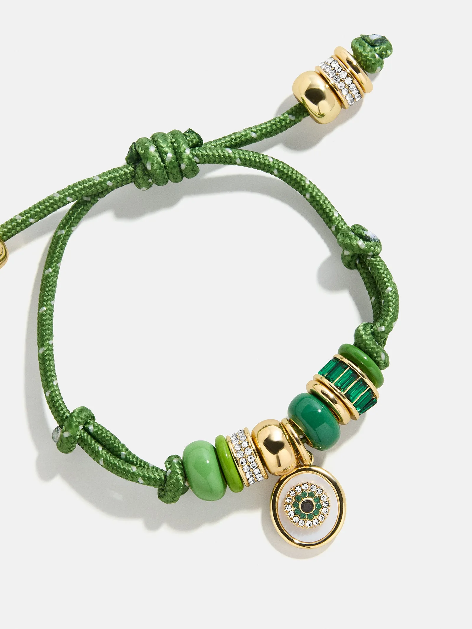Eye Candy Evil Eye Paracord Bracelet - Green sold by BaubleBar