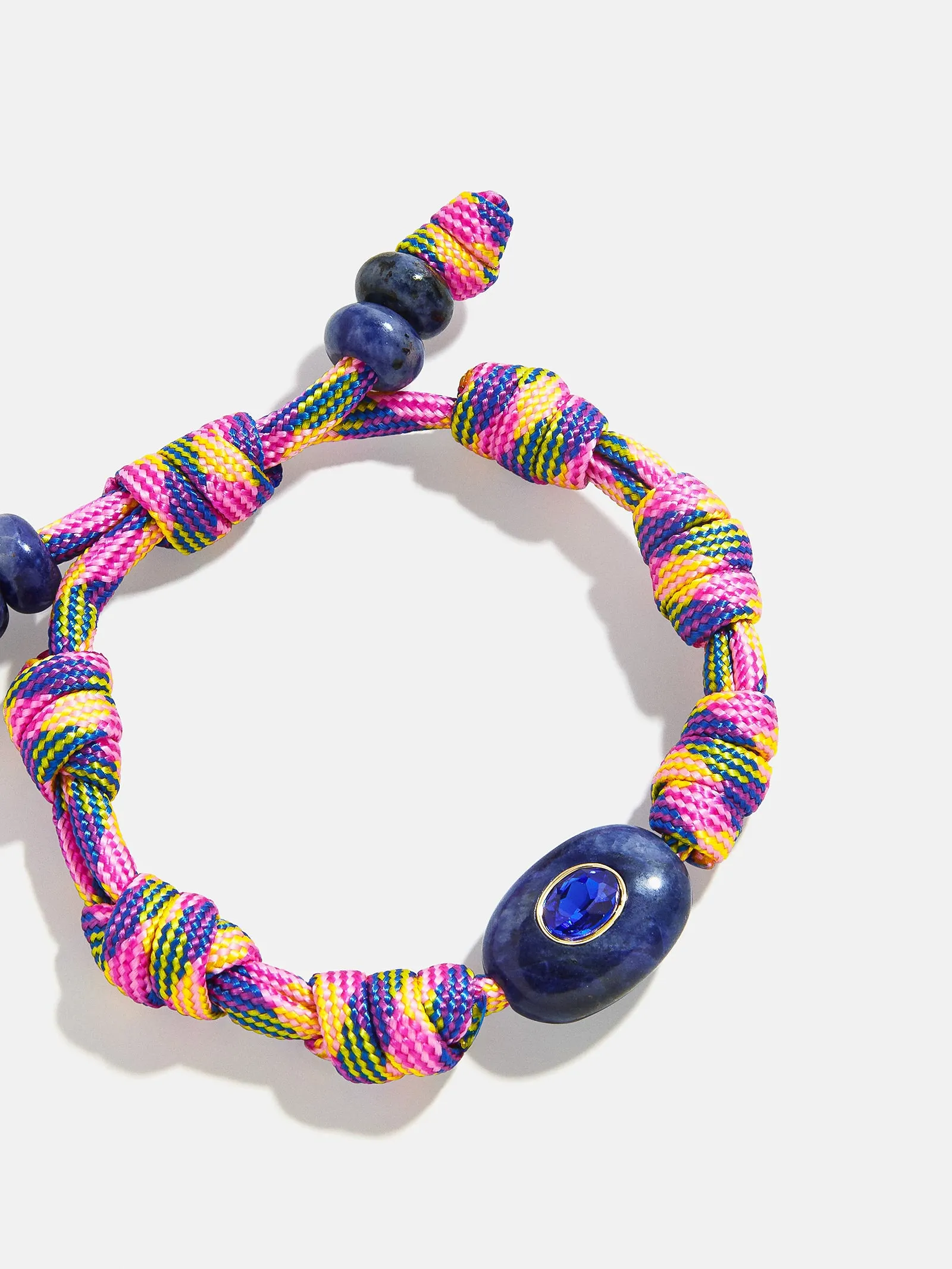 True Aura Semi-Precious Paracord Bracelet - Sodalite sold by BaubleBar