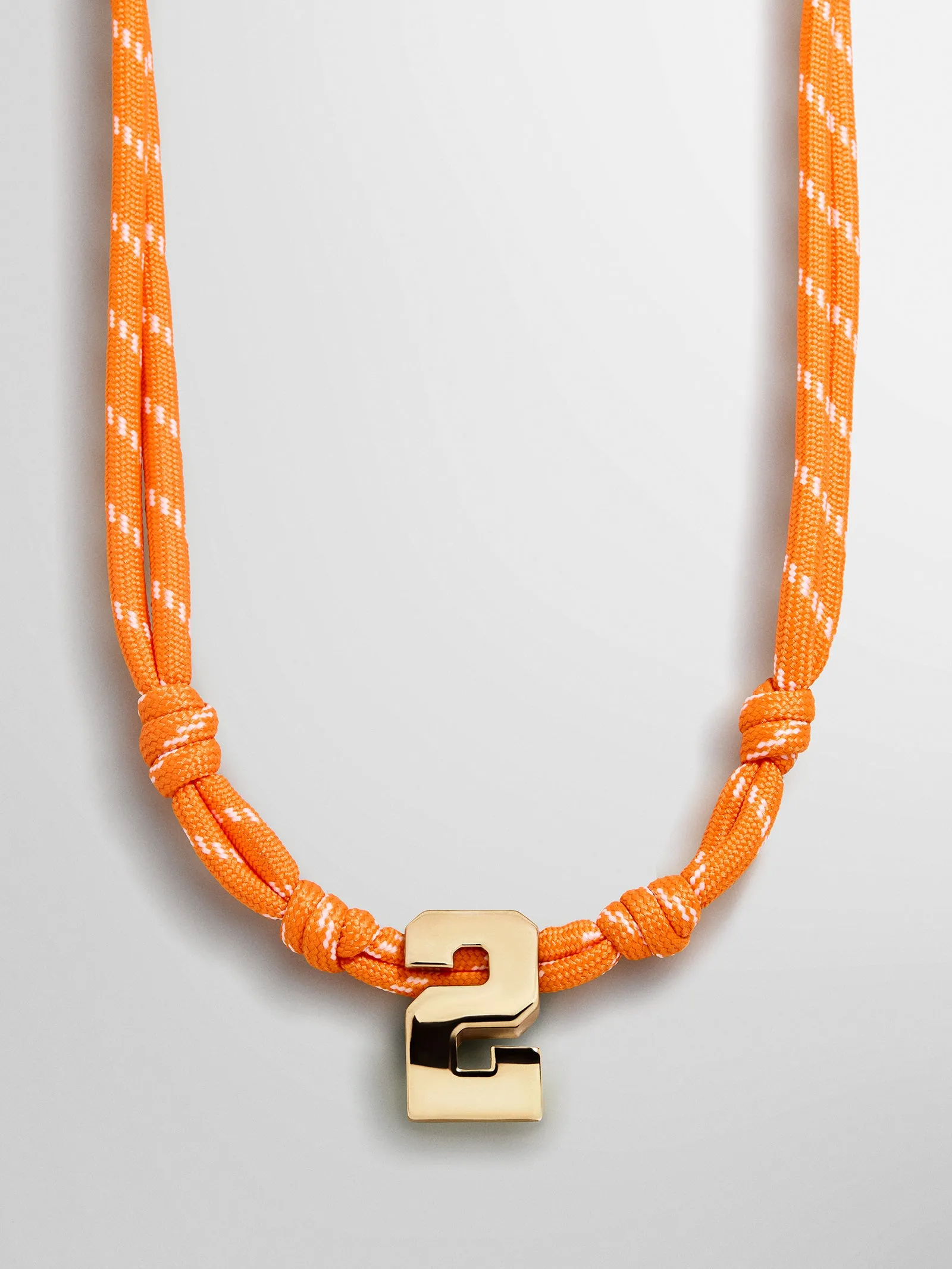 Knotty Varsity Custom Necklace - Tangerine Single Digit sold by BaubleBar product image thumbnail 3