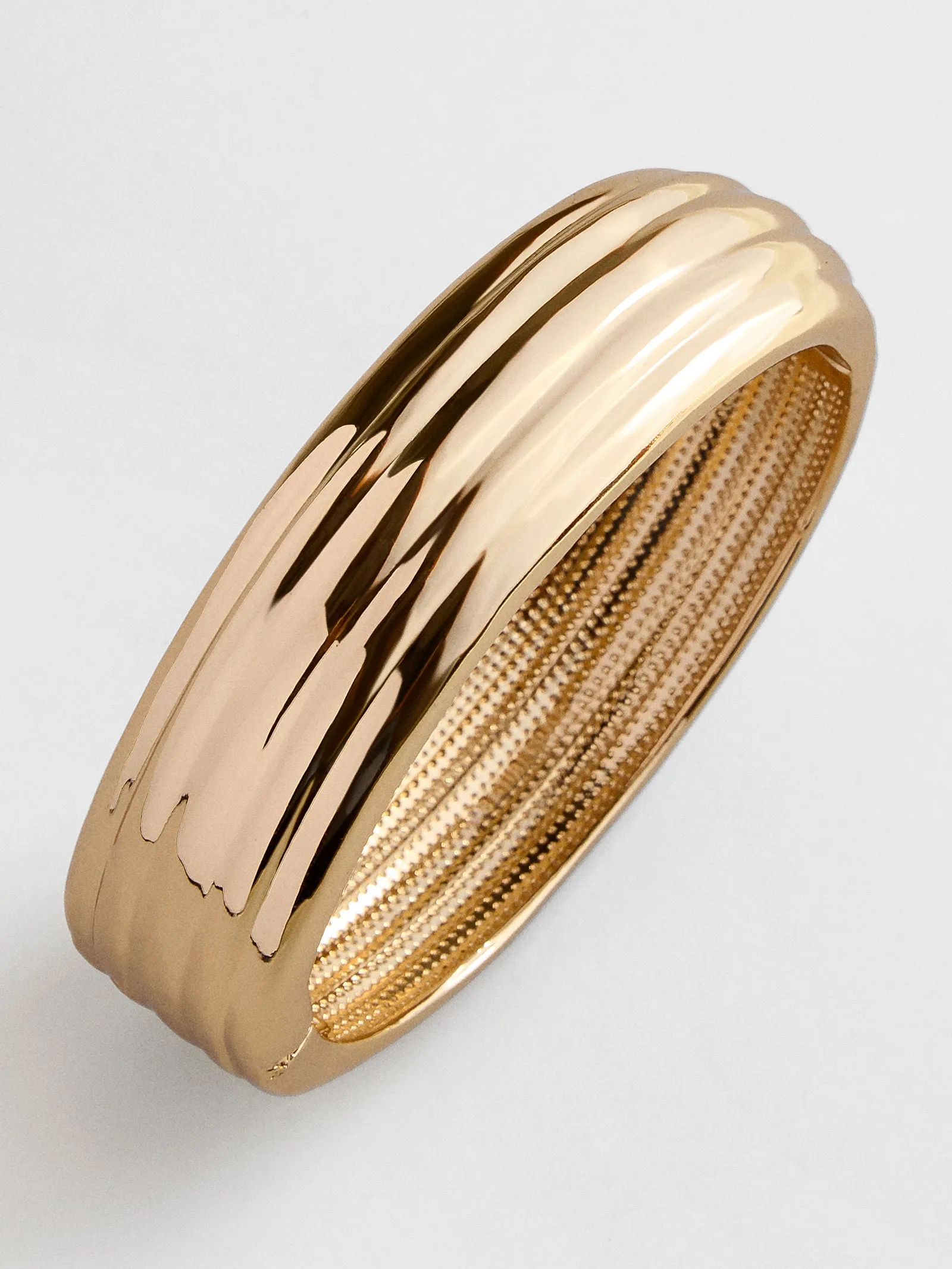 Odessa Hinge Bangle Bracelet - Gold sold by BaubleBar