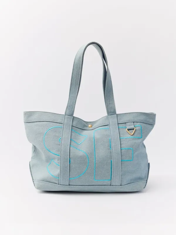Solid Custom Alpha Tote - Blue Denim made by BaubleBar
