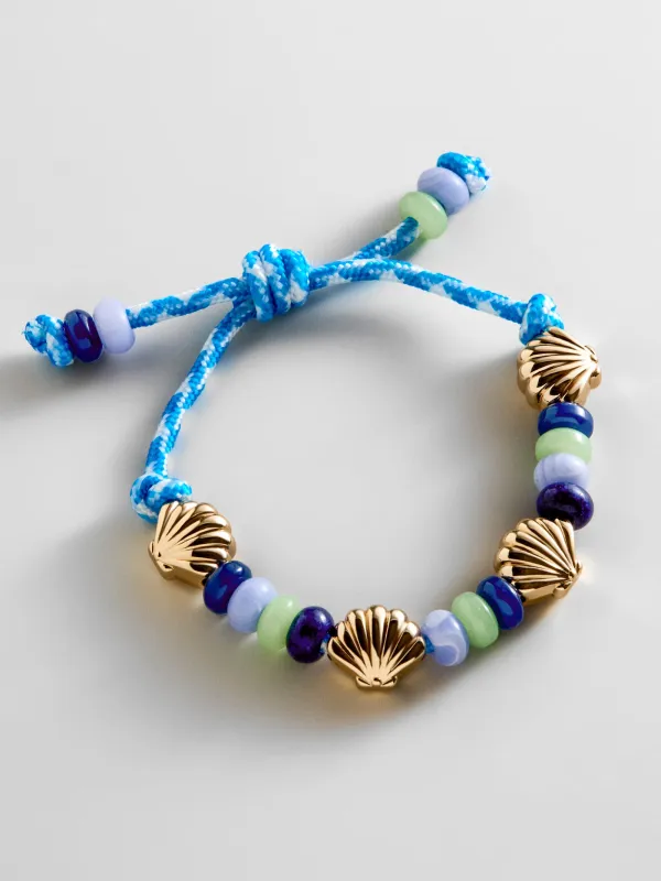 Happy Here Beaded Bracelet - Seashell made by BaubleBar