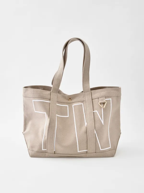 Solid Custom Alpha Tote - Toasted Almond made by BaubleBar