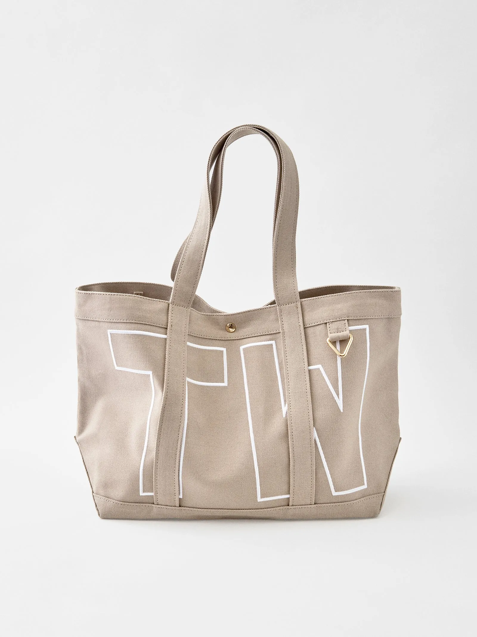 Solid Custom Alpha Tote - Toasted Almond sold by BaubleBar