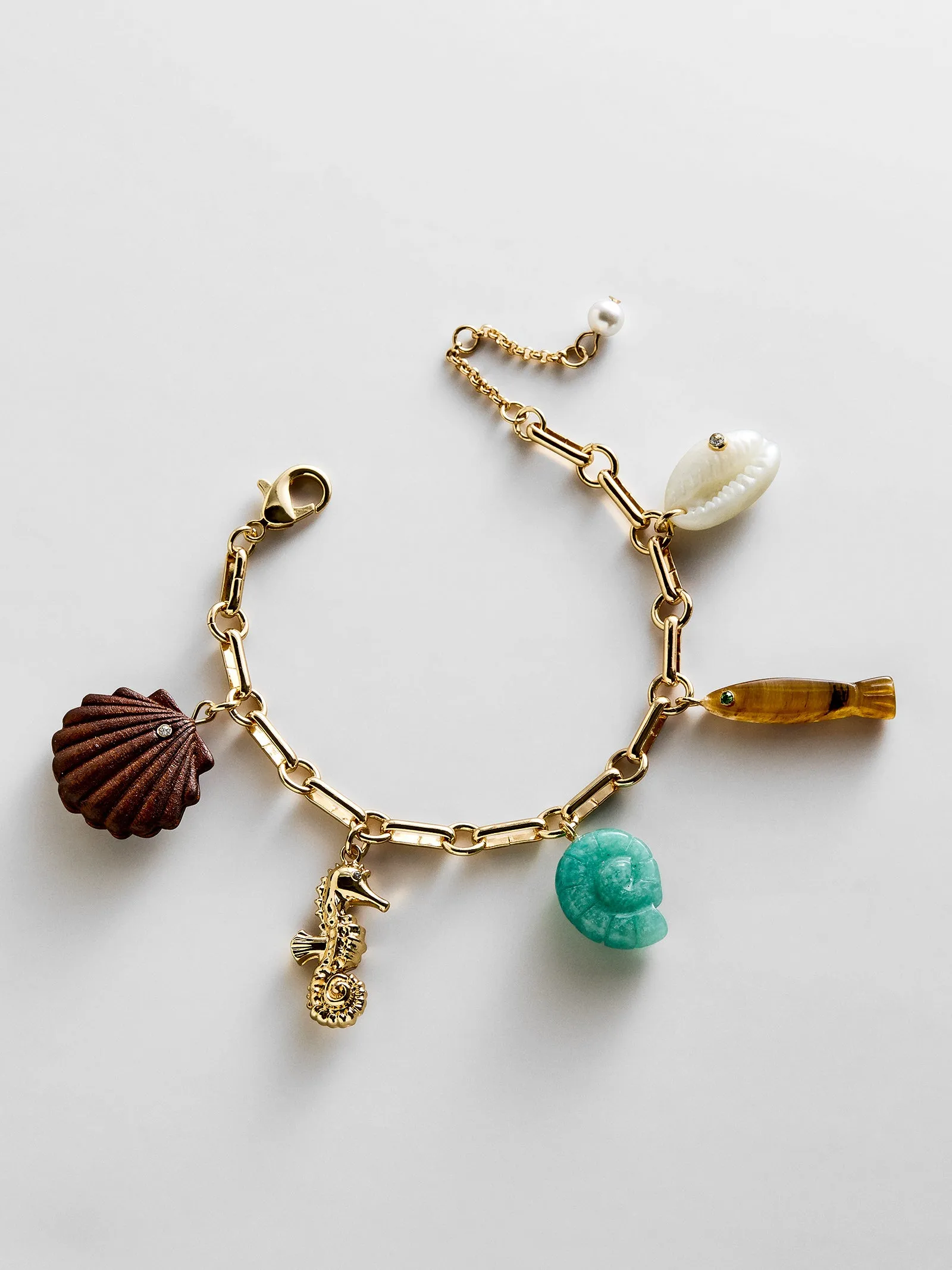 All At Sea Charm Bracelet - Gold/Turquoise sold by BaubleBar