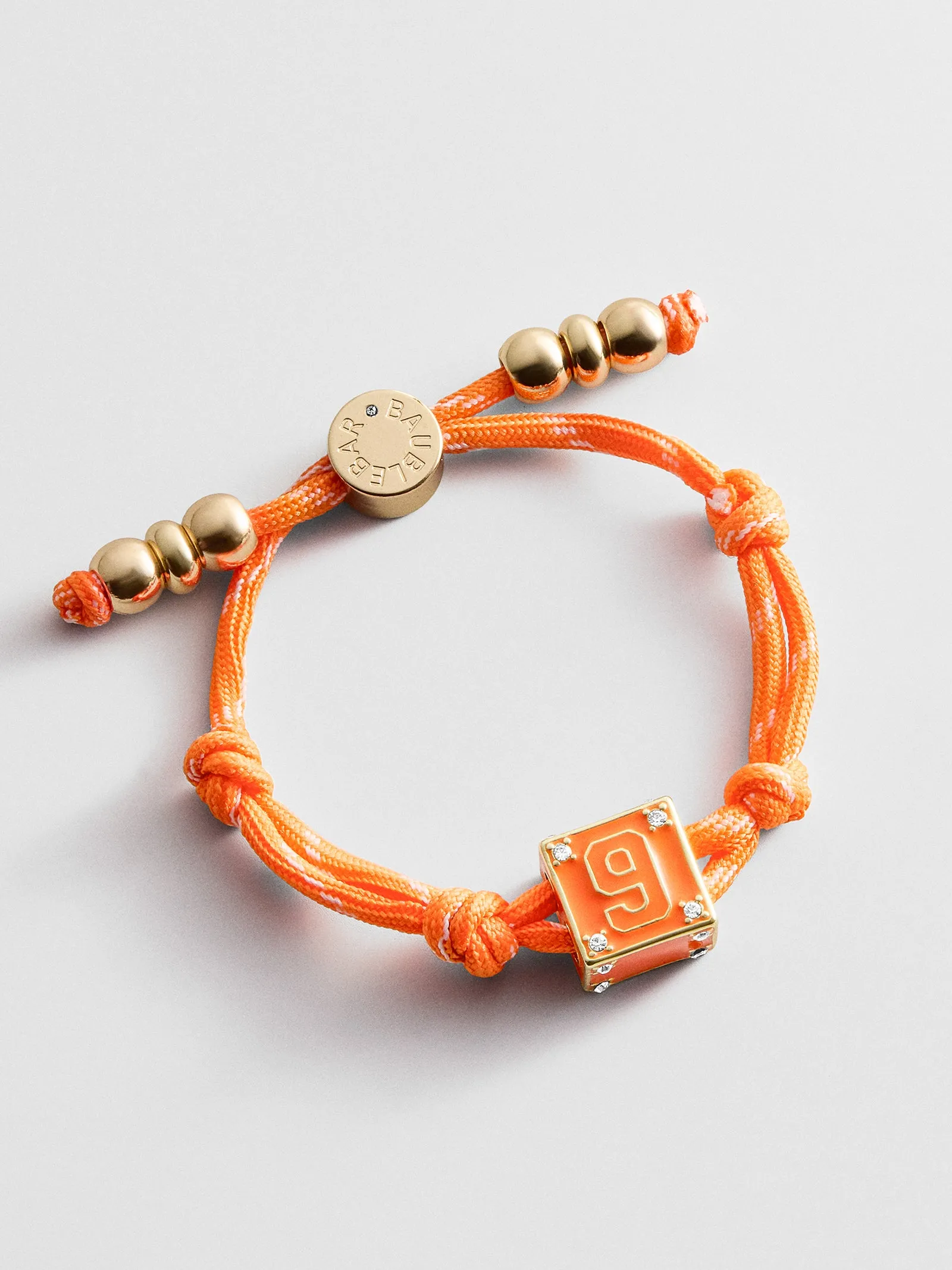 Block Party Varsity Number Custom Bracelet - Tangerine Single Digit sold by BaubleBar