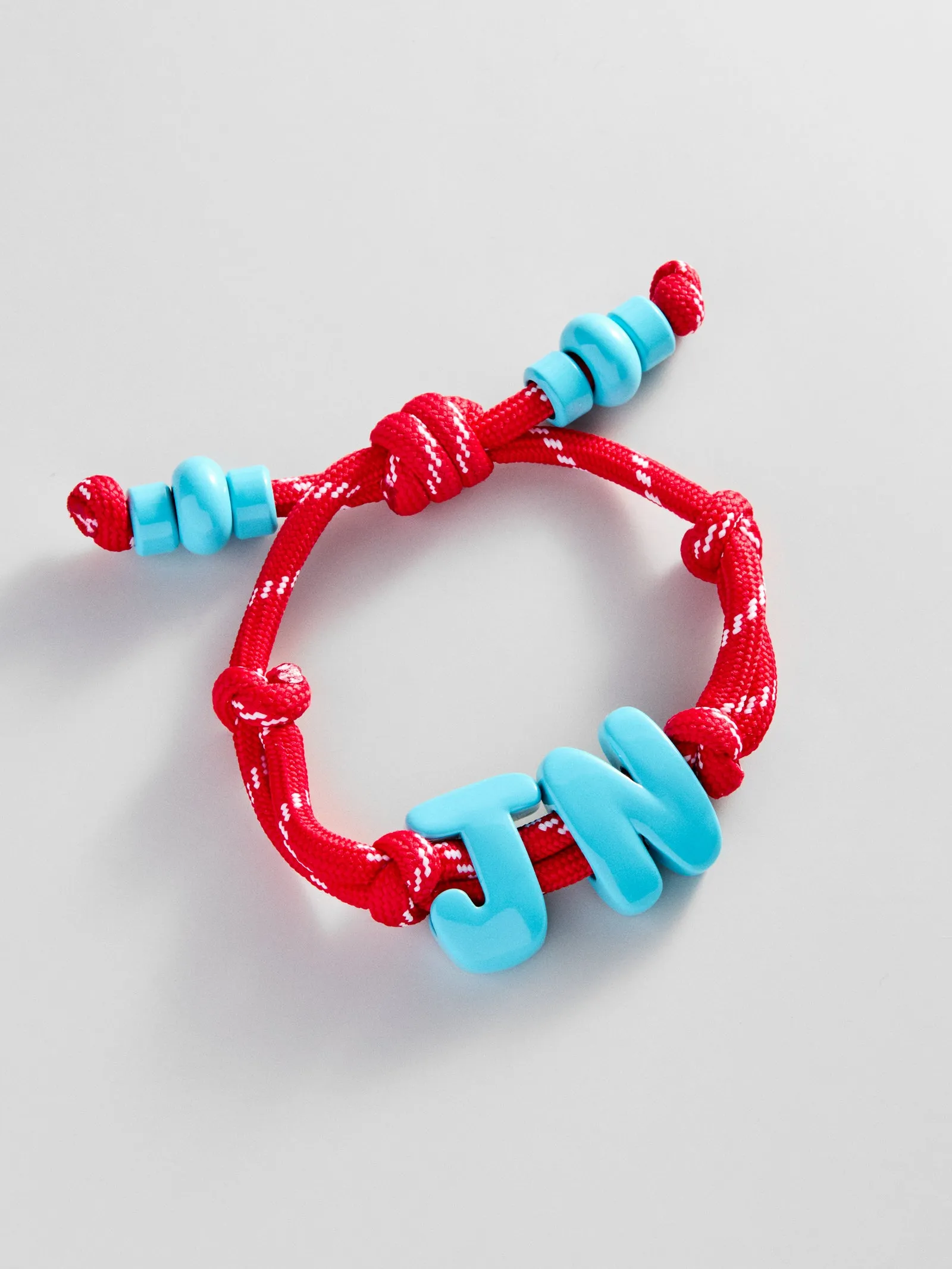 Knotty Enamel Initial Custom Bracelet - Red/Blue Double Letter sold by BaubleBar